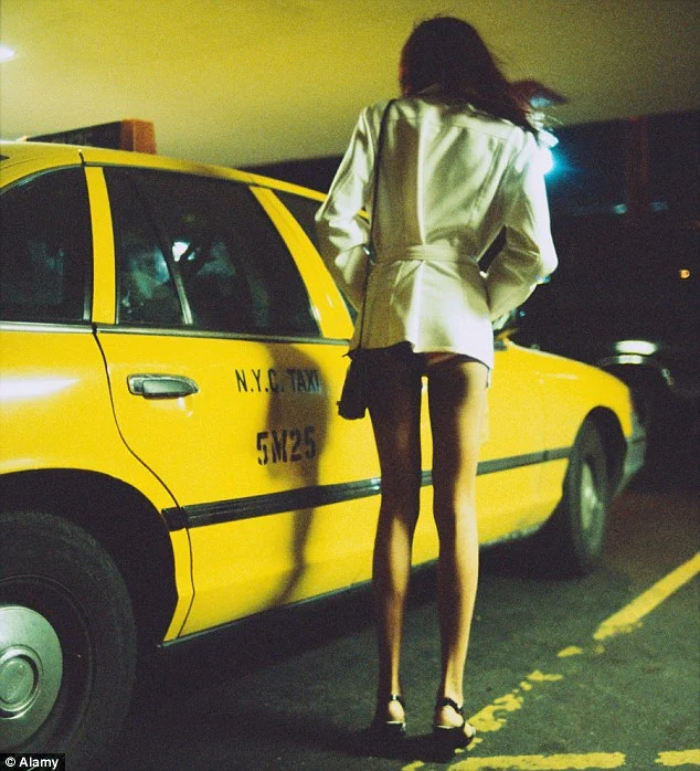 A woman in a white jacket stands beside a yellow taxi at night, highlighting the urban nightlife.